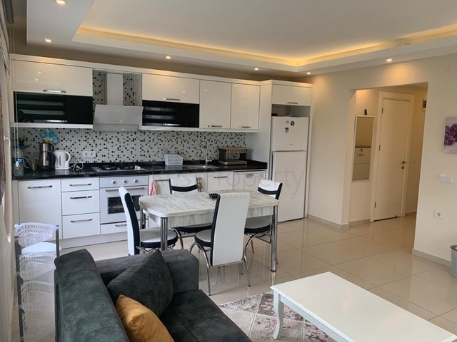 مجمع يضم كافة الخدمات -شقة غرفة وصالة مفروشة -في منطقة كاستل / الانيا 