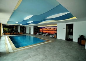 مجمع يضم كافة الخدمات -شقة غرفة وصالة مفروشة -في منطقة كاستل / الانيا 