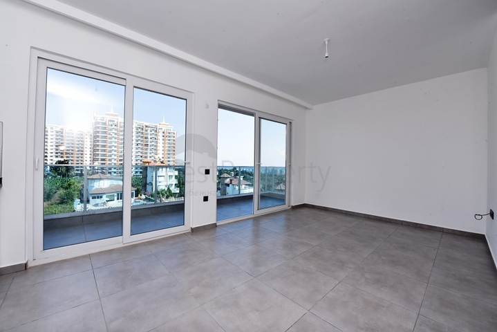 دوبلكس 2 غرفة وصالة -ضمن مجمع حديث - في مهموتلار / الانيا 