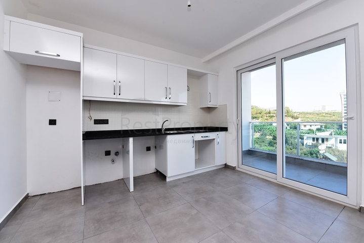 دوبلكس 2 غرفة وصالة -ضمن مجمع حديث - في مهموتلار / الانيا 