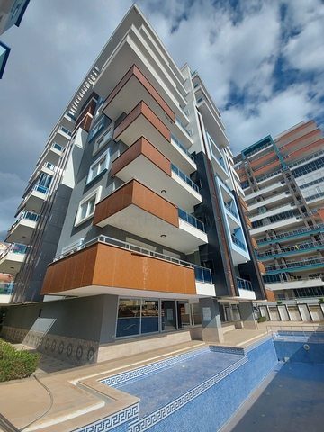 شقة انيقة - تصميم 1+1 - ضمن مجمع حديث -مهموتلار / الانيا 