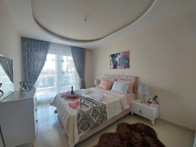 شقة انيقة - تصميم 1+1 - ضمن مجمع حديث -مهموتلار / الانيا 