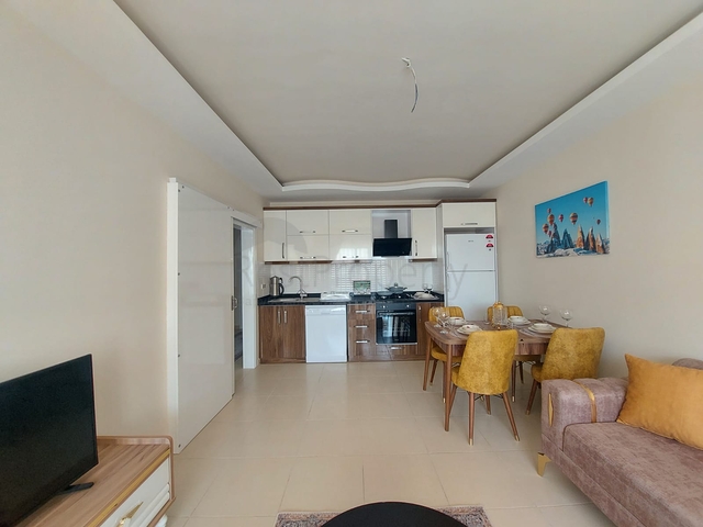 شقة انيقة - تصميم 1+1 - ضمن مجمع حديث -مهموتلار / الانيا 