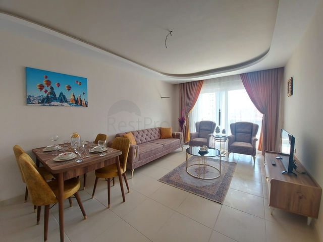 شقة انيقة - تصميم 1+1 - ضمن مجمع حديث -مهموتلار / الانيا 