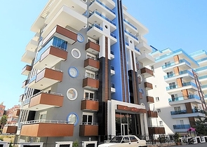 شقة انيقة - تصميم 1+1 - ضمن مجمع حديث -مهموتلار / الانيا 