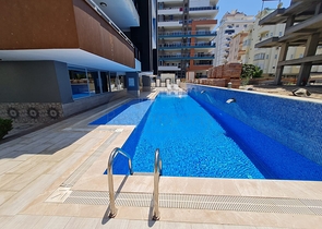 مجمع سكني حديث - شقة انيقة غرفة وصالة -مع الاثاث -في مهموتلار / الانيا 