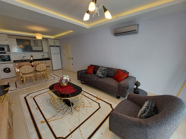 مجمع يضم كافة الخدمات - شقة غرفة وصالة -في مهموتلار / الانيا 