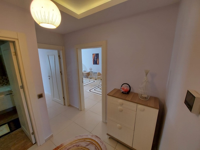 مجمع يضم كافة الخدمات - شقة غرفة وصالة -في مهموتلار / الانيا 