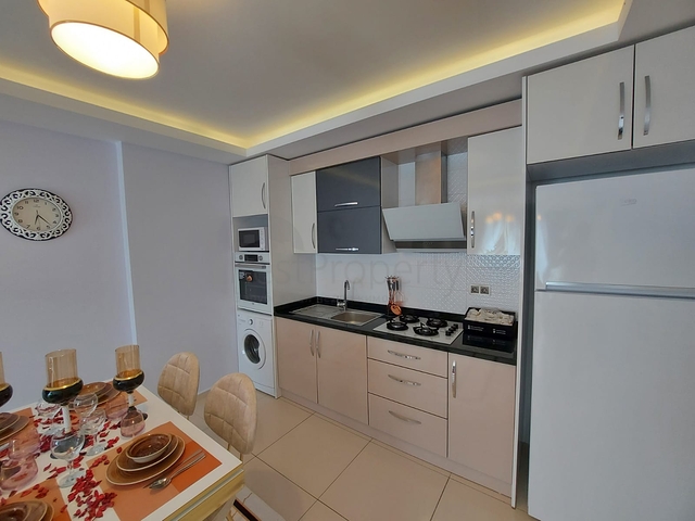 مجمع يضم كافة الخدمات - شقة غرفة وصالة -في مهموتلار / الانيا 