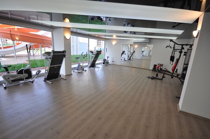 مجمع يضم كافة الخدمات - شقة غرفة وصالة -في مهموتلار / الانيا 