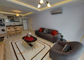 مجمع يضم كافة الخدمات - شقة غرفة وصالة -في مهموتلار / الانيا 