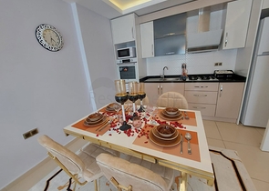 مجمع يضم كافة الخدمات - شقة غرفة وصالة -في مهموتلار / الانيا 