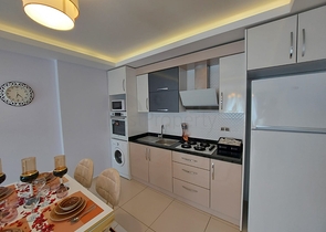 مجمع يضم كافة الخدمات - شقة غرفة وصالة -في مهموتلار / الانيا 