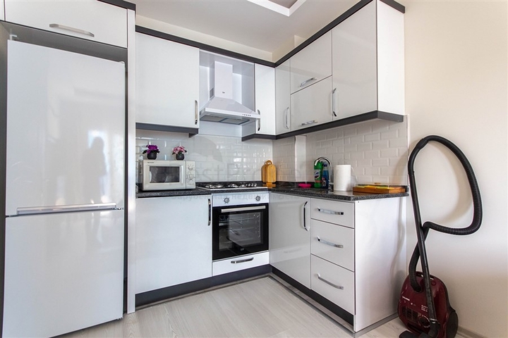 شقة غرفة وصالة -مجمع جديد - في مهموتلار / الانيا 