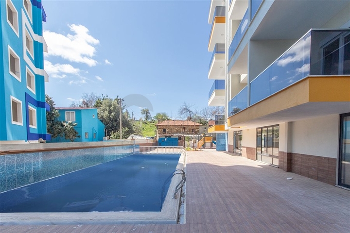 شقة غرفة وصالة -مجمع جديد - في مهموتلار / الانيا 