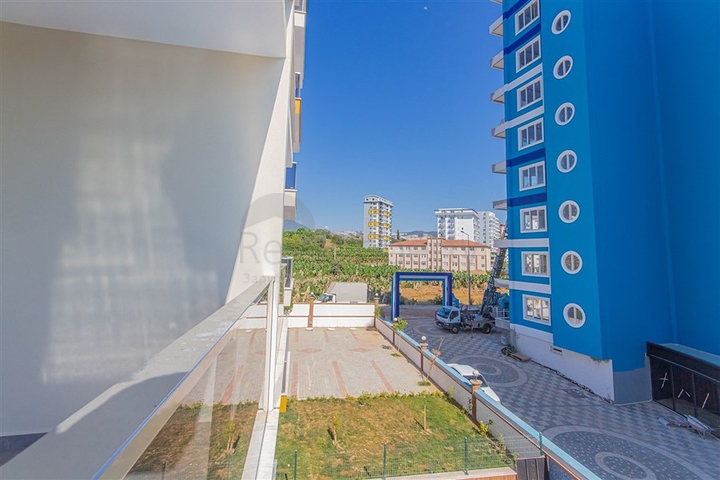 شقة غرفة وصالة -مجمع جديد - في مهموتلار / الانيا 