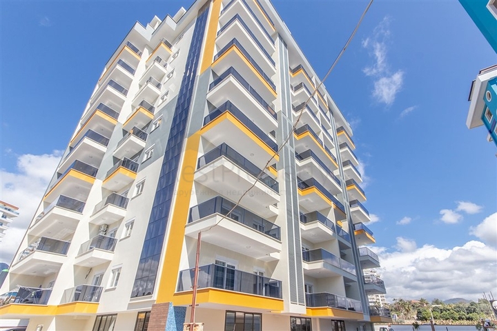 شقة غرفة وصالة -مجمع جديد - في مهموتلار / الانيا 