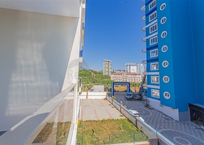 شقة غرفة وصالة -مجمع جديد - في مهموتلار / الانيا 