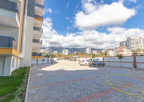 شقة غرفة وصالة -مجمع جديد - في مهموتلار / الانيا 