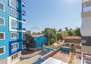 شقة غرفة وصالة -مجمع جديد - في مهموتلار / الانيا 