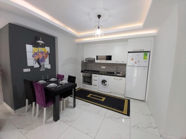 شقة ضمن مجمع فاخر - تصميم 1+1 - مفروشة -في مهموتلار / الانيا 