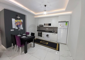 شقة ضمن مجمع فاخر - تصميم 1+1 - مفروشة -في مهموتلار / الانيا 