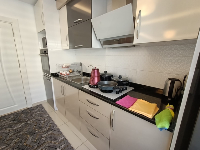 شقة انيقة للبيع -ضمن مجمع فاخر - في مهموتلار / الانيا 