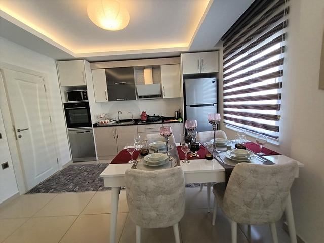 شقة انيقة للبيع -ضمن مجمع فاخر - في مهموتلار / الانيا 