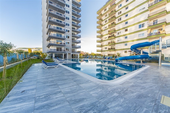 مجمع انيق - يضم كافة الخدمات -شقة 1+1- مفروشة -في مهموتلار / الانيا 