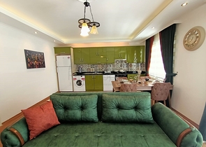 شقة غرفة وصالة انيقة  - ضمن مجمع سكني في منطقة حيوية -مهموتلار / الانيا 