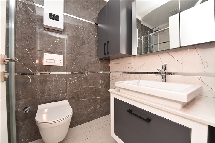 شقة غرفة وصالة -مجمع حديث - في افسلار / الانيا 