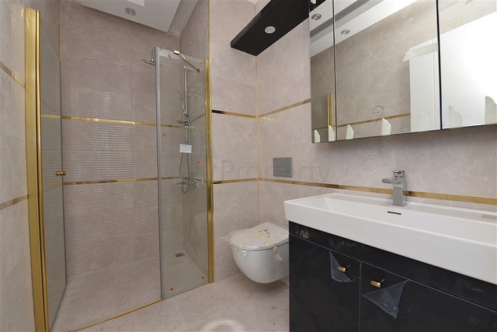 شقة جديدة - 2 غرفة وصالة -مجمع سكني فاخر -في مهموتلار / الانيا 