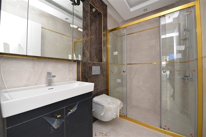 شقة جديدة - 2 غرفة وصالة -مجمع سكني فاخر -في مهموتلار / الانيا 