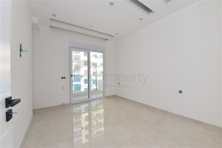 شقة جديدة - 2 غرفة وصالة -مجمع سكني فاخر -في مهموتلار / الانيا 