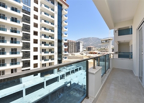 شقة جديدة - 2 غرفة وصالة -مجمع سكني فاخر -في مهموتلار / الانيا 