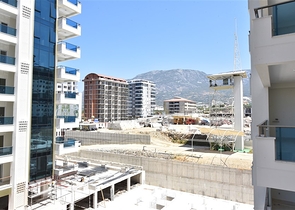 شقة جديدة - 2 غرفة وصالة -مجمع سكني فاخر -في مهموتلار / الانيا 