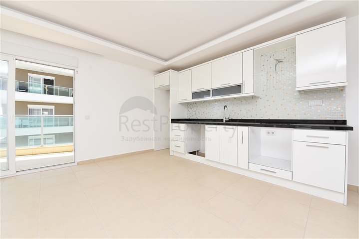 شقة غرفة وصالة -ضمن مجمع يضم كافة الخدمات -في افسلار / الانيا