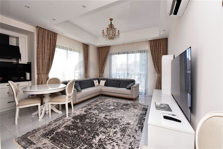 شقة ضمن مجمع فاخر -تصميم 1+1 - في مهموتلار / الانيا 