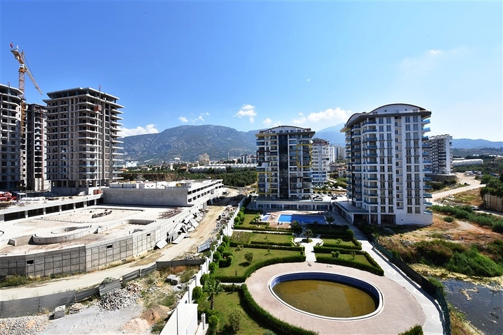 شقة ضمن مجمع فاخر -تصميم 1+1 - في مهموتلار / الانيا 