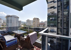 شقة ضمن مجمع فاخر -تصميم 1+1 - في مهموتلار / الانيا 