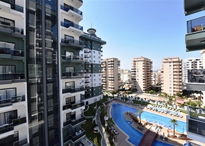 شقة ضمن مجمع فاخر -تصميم 1+1 - في مهموتلار / الانيا 