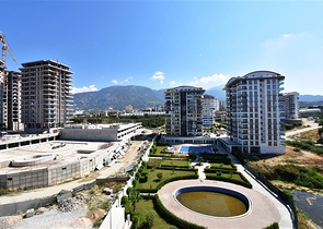 شقة ضمن مجمع فاخر -تصميم 1+1 - في مهموتلار / الانيا 