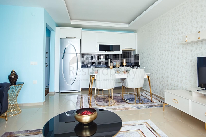 شقة طابق مرتفع -تصميم 1+1 - في مهموتلار / الانيا 