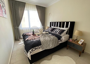 شقة اطلالة بحر في الانيا -تصميم 1+2 - مفروشة -في مهموتلار / الانيا 