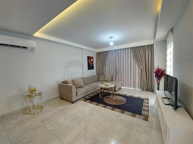 شقة واسعة نسبيا - غرفة نوم وصالة -ضمن مجمع - في مهموتلار / الانيا 