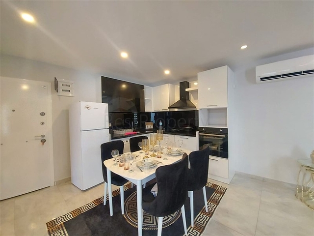 شقة واسعة نسبيا - غرفة نوم وصالة -ضمن مجمع - في مهموتلار / الانيا 