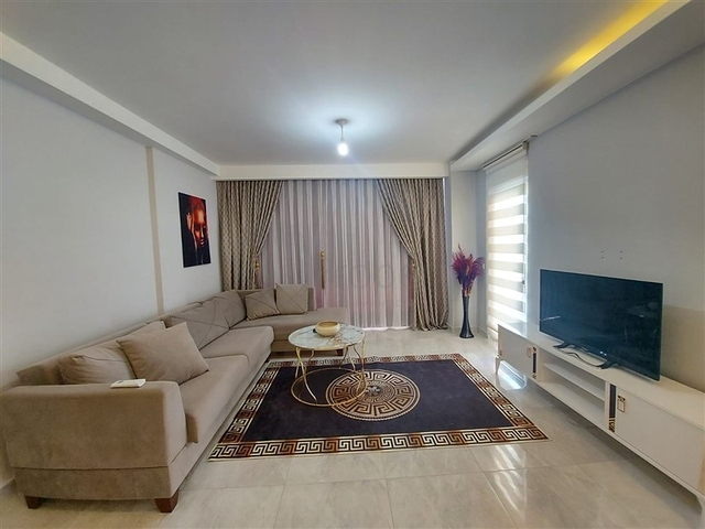 شقة واسعة نسبيا - غرفة نوم وصالة -ضمن مجمع - في مهموتلار / الانيا 