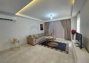 شقة واسعة نسبيا - غرفة نوم وصالة -ضمن مجمع - في مهموتلار / الانيا 