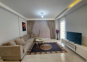 شقة واسعة نسبيا - غرفة نوم وصالة -ضمن مجمع - في مهموتلار / الانيا 