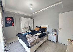 شقة واسعة نسبيا - غرفة نوم وصالة -ضمن مجمع - في مهموتلار / الانيا 